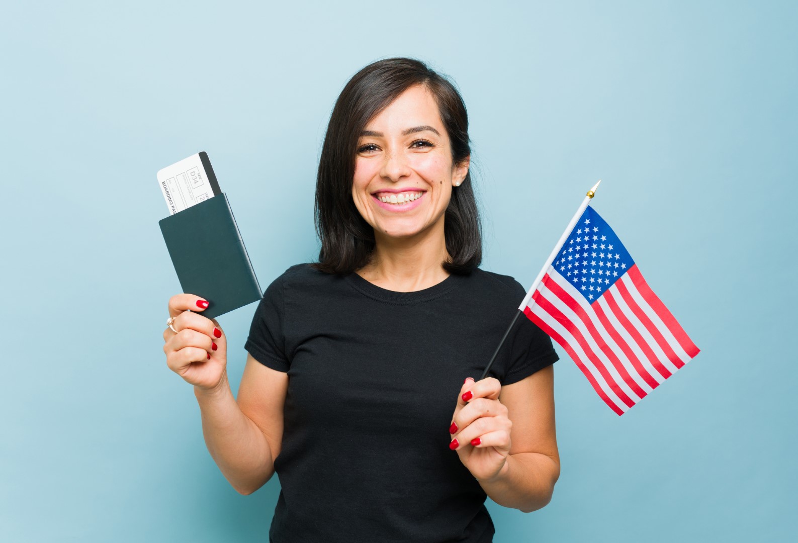Gorgeous woman feeling patriot with the passport and US flag | Call 918-505-4870